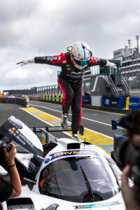 Maxim Dirickx celebrating on his car